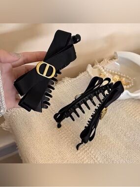 Macy's Black Bow Hair Claw Clip with Gold Emblem